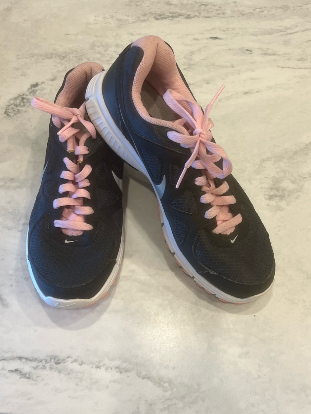Nike Revolution Women’s Black and Pink Sneakers